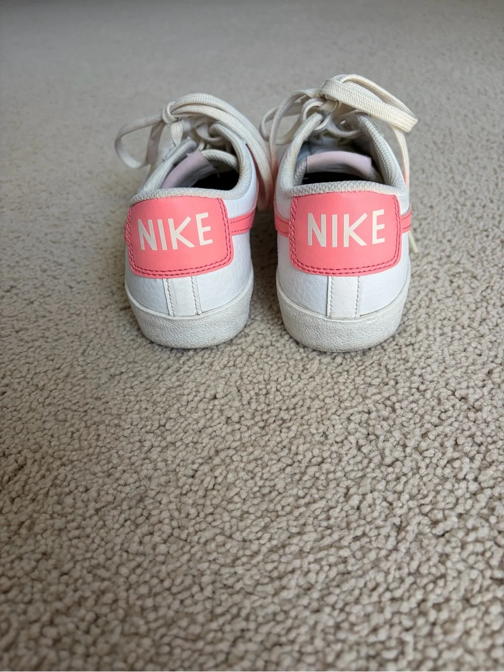 Nike White Leather Low-Top Sneakers with Pink Swoosh